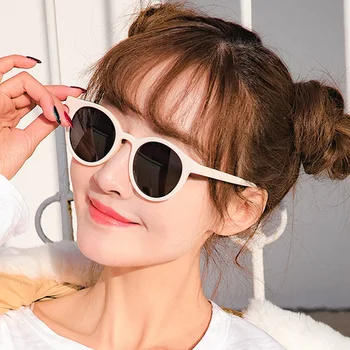 Versão coreana rodada quadro de tendência de moda óculos de sol feminino Instagram rede de vermelho com a mesma rua, tiro doce de leite, chá de tons